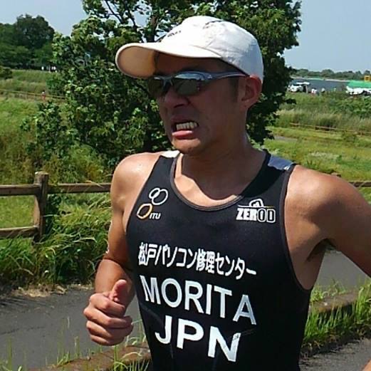 トライアスロン大会を走るTMさん